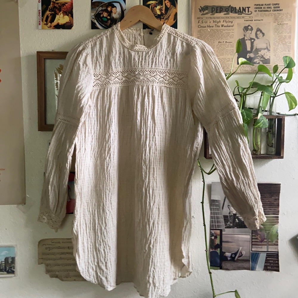 Zara cream color tunic shirt. Very light cool material. Like new worn twice.